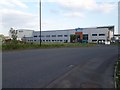NZ2669 : Greggs factory, Gosforth Business Park by Graham Robson