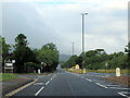 Brockworth village sign on A46 at Henley Bank Road junction