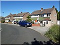 NZ2468 : Semi detached houses on Cheswick Drive, Gosforth, Newcastle upon Tyne by Graham Robson