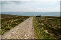 SD9699 : Melbecks Moor track by Andy Waddington