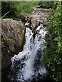 NN1468 : The Water of Nevis cascades over Eas Bhuidhe waterfall by Steve Daniels