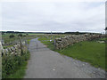 Gate across the public road at Buttoner House Farm