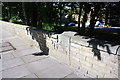 Old milestone set in wall on NE side of Manningham Lane (A650)