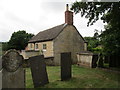 Cottage by the churchyard, Colsterworth