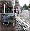 ST2995 : Shopping trolley storage area in Cwmbran bus station by Jaggery