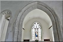 TL9558 : Gedding, St. Mary's Church: Chancel arch and one of two side arches by Michael Garlick