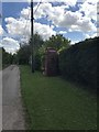 TL2942 : Disused phone box - Morden Green by Dave Thompson
