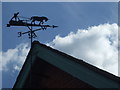 A rural weathervane on the pub