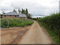 Minor road and new housing at Stripes