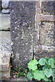 Possible Ordnance Survey cut mark benchmark on wall fronting #15 Smithwell Lane