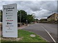 Entrance to Freshbrook Centre and a bus stop