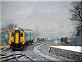 SD7678 : A train for Carlisle departing from Ribblehead by John Lucas