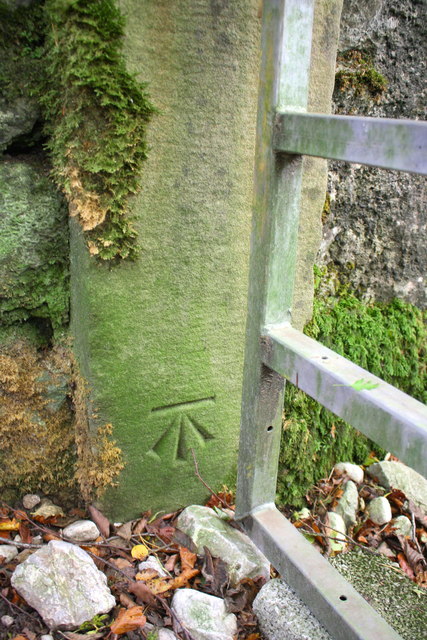 Benchmark on gatepost of gateway on south side of Thwaite Lane