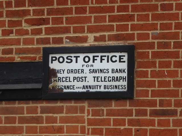 Sign on the wall of the Old Post Office, Alderton