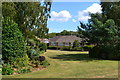 Bungalows overlooking green on Greenfield Crescent