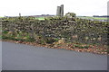 View over dry stone wall on NW side Sun Lane towards Lumb Foot