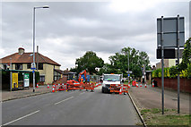 TL4757 : Perne Road: repairing a sink hole by John Sutton