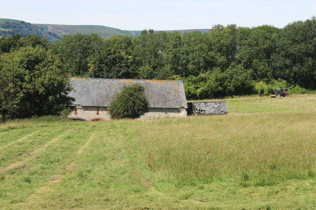 Farm building in hillside meadow