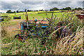 Old Overgrown Tractor