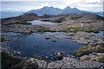 NM4584 : Lochans of the ridge of An Sgùrr, Isle of Eigg by Julian Paren