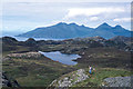 NM4684 : Walking the ridge of An SgÃ¹rr, Isle of Eigg by Julian Paren
