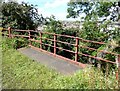 NZ2053 : Railway bridge railings, Shield Row by Adrian Taylor