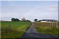 NK0563 : Road leaving St Combs and Charlestown by Richard Webb