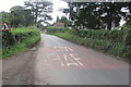 Faded road markings on the approach to Llanarth, Monmouthshire