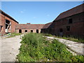 Old derelict farm courtyard at Bradley Farm