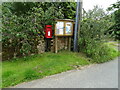 Elizabeth II postbox and notice board, Langthorne