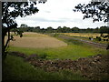 Fields and railway line west of Stenson