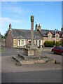 NT7771 : Old Wayside Cross, The Square, Cockburnspath by Mike Rayner
