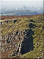 SK0795 : Dog Rock with a distant view of Manchester by Neil Theasby