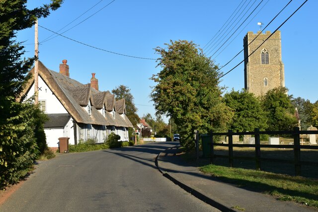 Thatched cottages opposite the churchyard, Tattingstone