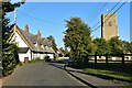 Thatched cottages opposite the churchyard, Tattingstone