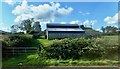 Farm house and outbuildings between the A2 (Dundrum Road) and the Old Road 