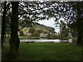 Kilnsey village across one of the fishing lakes at Kilnsey Park