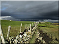 L9483 : Stone Wall and Dark Clouds by kevin higgins