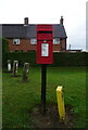 TF9932 : Elizabeth II postbox on The Street, Barney by JThomas