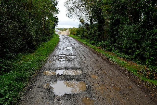 potholes-along-a-muddy-lane-mullaghmore-kenneth-allen-cc-by-sa-2-0