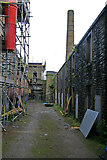 SD8332 : Back of Slater Terrace and Sandygate Mill, Burnley by Chris Allen