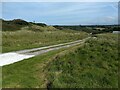 The side road leads to a secluded caravan/chalet