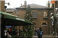 View of a large Christmas tree in Camden Market