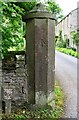 Gatepost with benchmark at entrance to Gardens Road