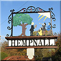 TM2494 : Hempnall village sign by Adrian S Pye