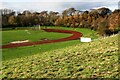 View of sports ground with running track on west side of North Street