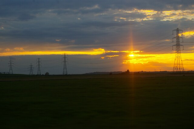 Pylons across Graveney Marshes, sunset