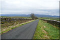 NY7011 : Minor road northeast of Whygill Head by Andy Waddington