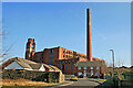 Hartford Mill seen down Ridings Way, Oldham 