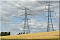 Pylons and fields at harvest time, Burgh